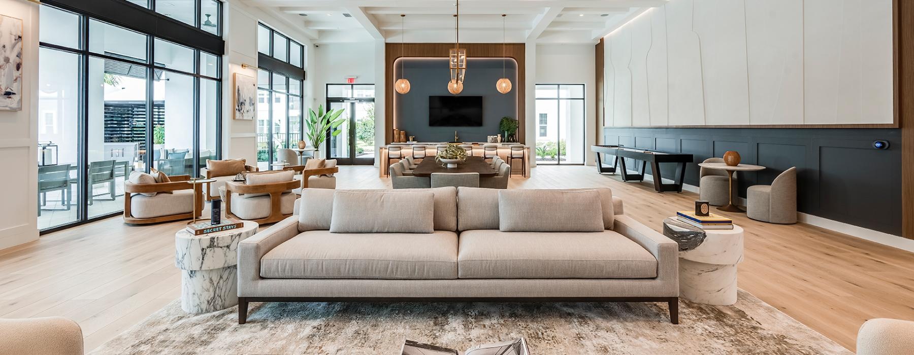 spacious lounge area with modern custom shaped walls and ceiling