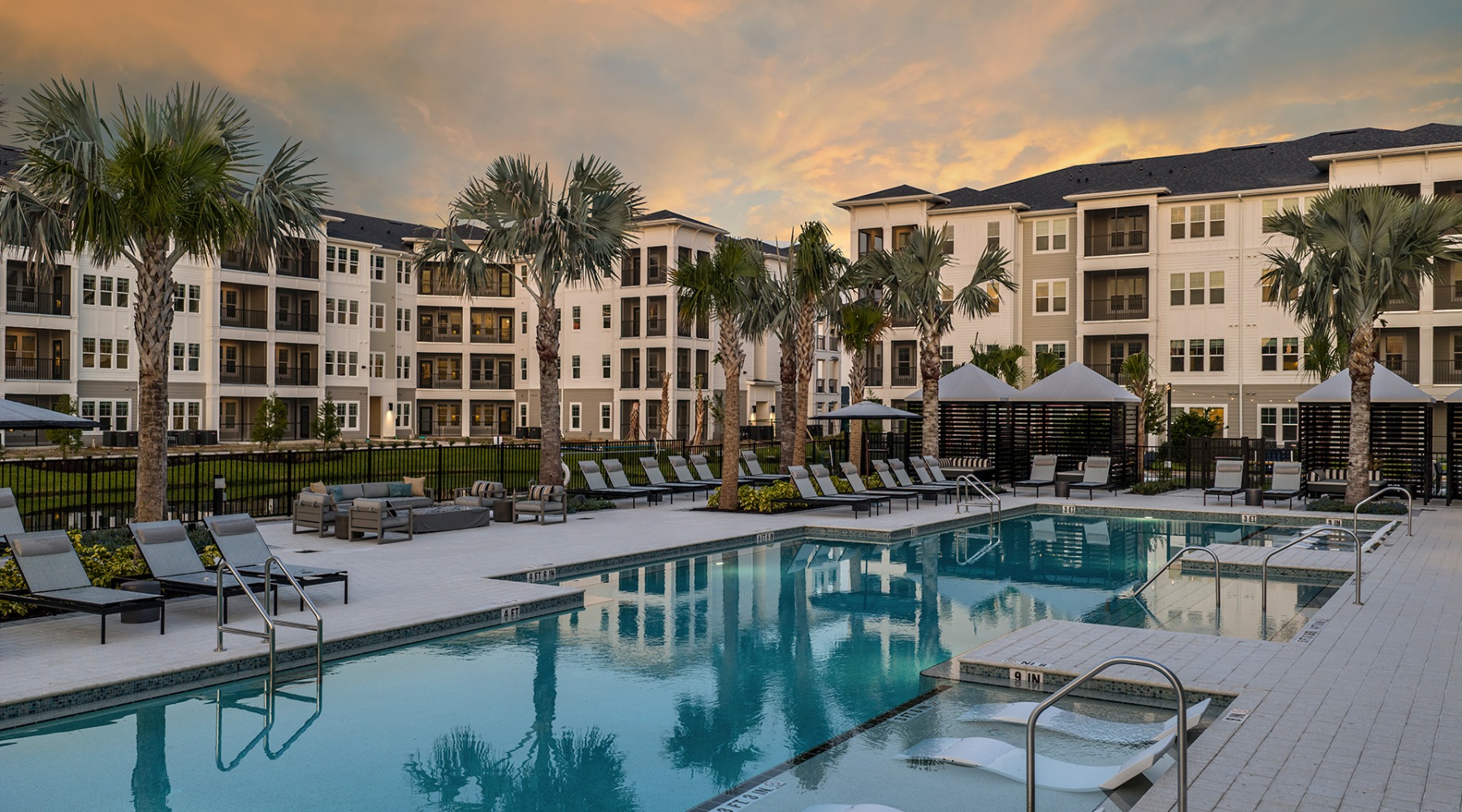 pool with spacious areas and lush landscaping